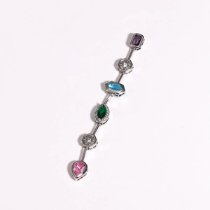 Detailed view of silver dangle earring with colorful zircon stones in various shapes