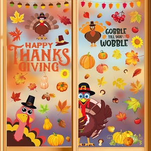 Macro detail of Thanksgiving window stickers featuring festive turkey and pumpkin designs