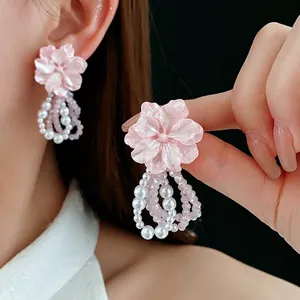 Elegant floral pearl tassel earrings in pink shell finish with French vintage style charm