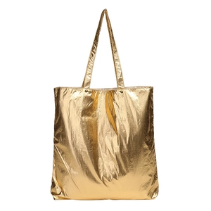 Retro golden metallic nylon tote bag with minimalist glossy finish and shoulder straps