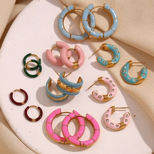 Chic 18K gold plated enamel donut hoop earrings in assorted vibrant colors on a tray