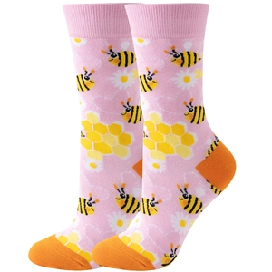 Detail of pink cotton crew socks featuring honeybee and honeycomb patterns with orange heels