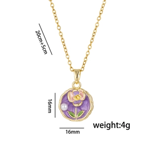 Gold enamel flower necklace with purple base and white pearl detail on white background