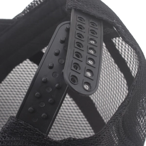 Close-up of the adjustable snapback closure and mesh texture on this black baseball cap
