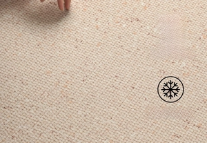 Macro shot of heat-resistant beige woven carpet texture suitable for underfloor heating