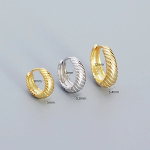 925 sterling silver hoop earrings with irregular textured twist in gold and silver