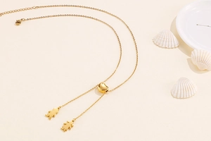 Collier en Y doré avec curseur coeur et silhouettes de petit garçon et fille