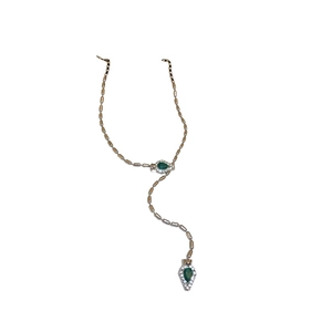 Minimalist silver snake Y-necklace with green emerald-style teardrop pendants and crystals