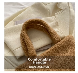 Close-up of thick caramel brown teddy plush handle on a stylish autumn handbag