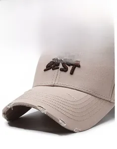 Detail of vintage baseball cap with BEST 3D embroidery and distressed brim details