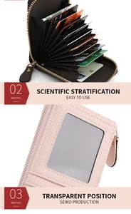 Detail view of pink leather wallet with multiple accordion card slots and clear ID window