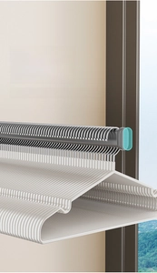 Detail showing the non-slip stop rod design on a wall-mounted white clothes hanger rack