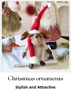 Detail of Christmas reindeer gnome doll and plush deer with warm festive holiday lighting