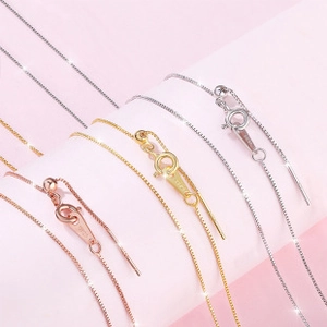 Detailed close-up of S925 sterling silver box chains in silver, gold, and rose gold