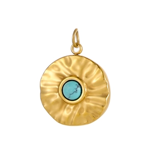 Detailed close-up of golden hammered round pendant with natural turquoise inlay