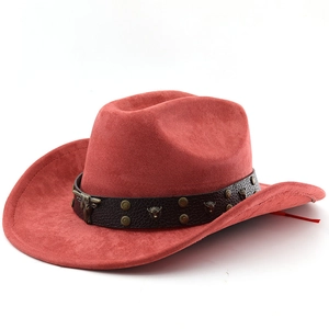 Detail of red suede cowboy hat with vintage metal bull head rivets on leather band