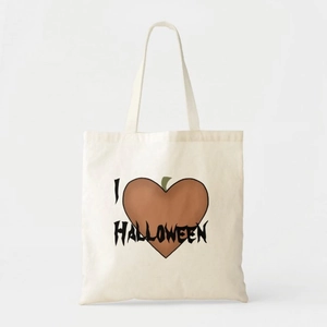 Detail of canvas tote bag with heart-shaped pumpkin and Halloween printed graphics
