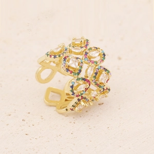 Gold hollow open ring with colorful zircon eye and heart motifs for women