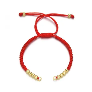 Handmade red braided cord bracelet with adjustable gold beads and knots for lucky charms