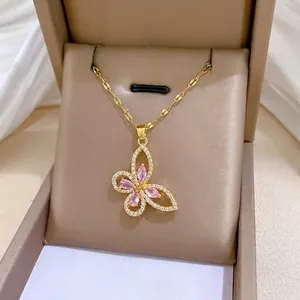 Elegant gold butterfly pendant necklace with pink zircon and diamonds in gift box
