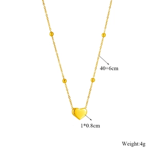 Collier minimaliste avec pendentif cœur doré et chaîne à billes en acier inoxydable