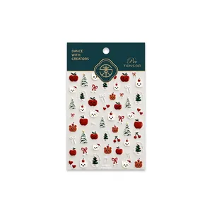 Christmas nail art stickers featuring cute cats, trees, and bears on high-definition decals