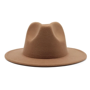 Detail view of brown felt fedora hat featuring teardrop crown and stitched wide brim