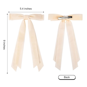 Detail view of cream velvet bow hair clip showing dimensions and silver spring metal clip