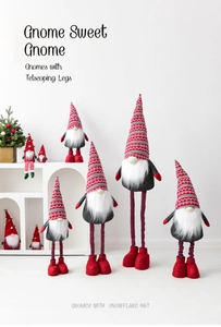Detail of Christmas gnomes with telescoping legs and snowflake pattern knitted hats