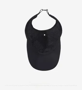 Detail view of the breathable mesh lining and adjustable strap on a black sports sun visor