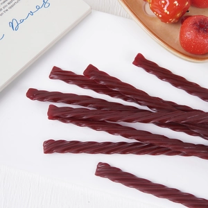 Realistic twisted hawthorn fruit strips snack props with deep red color and spiral texture