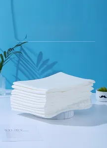 Detail showing thick white non-woven fabric texture of disposable pet bath towels