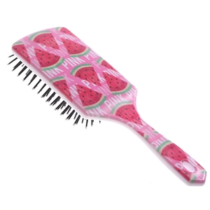 Detailed view of pink air cushion hairbrush featuring cute watermelon prints and PINK text