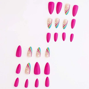 Long almond press-on nails with magenta polish, rainbow swirls, and white heart designs