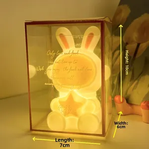 Astronaut bunny night light in gift box with warm yellow glow, size 10x7x6cm