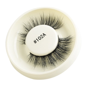Detail view of natural self-adhesive false eyelashes style 102A in a white storage case