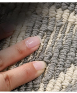 Macro shot of double-layer dense weave entryway mat showing thick non-slip texture