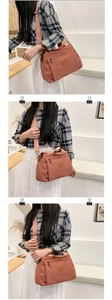 Detailed views of an orange pink canvas shoulder bag with premium leather handles