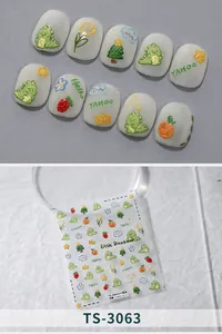 Detail of 3D embossed nail stickers featuring cute dinosaurs and floral patterns