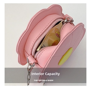 Internal view of pink sunflower shoulder bag for kids showing storage capacity