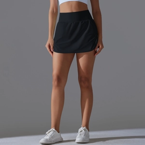 Detail of high-waisted black athletic skirt with wide waistband for tummy control