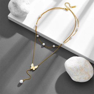 Double-layered titanium steel butterfly necklace with pearls and tassel pendant