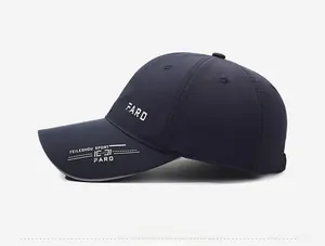 Detail of navy breathable quick-dry baseball cap with white athletic lettering and vents