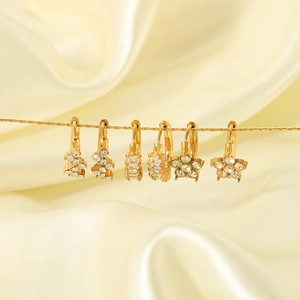 Set of 18K gold plated stainless steel hoop earrings with crystal clover and star charms