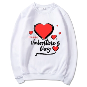 White crewneck sweatshirt with red heart prints and Happy Valentine's Day text