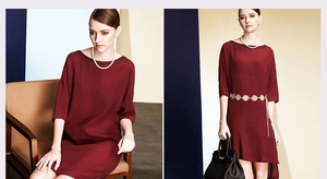 Detail of burgundy textured dress featuring hollow metal circle chain belt and accessories