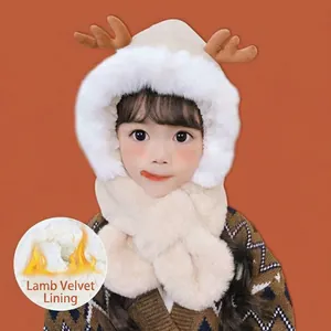 Kids winter reindeer hat with ear flaps and sherpa lining for warmth in cream white
