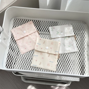 Detailed set of floral sanitary storage bags with cute animal prints and button closure