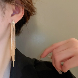 Elegant gold long chain tassel earrings for women featuring a stylish V-shape design