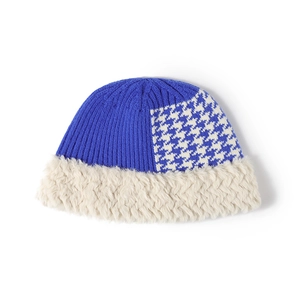 Contrast winter knit beanie with blue houndstooth pattern and faux fur trim for warmth